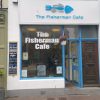 The Fisherman Cafe front entrance with menu board and open door, inviting customers in Bridlington